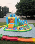 Rental - multicolor bounce house only